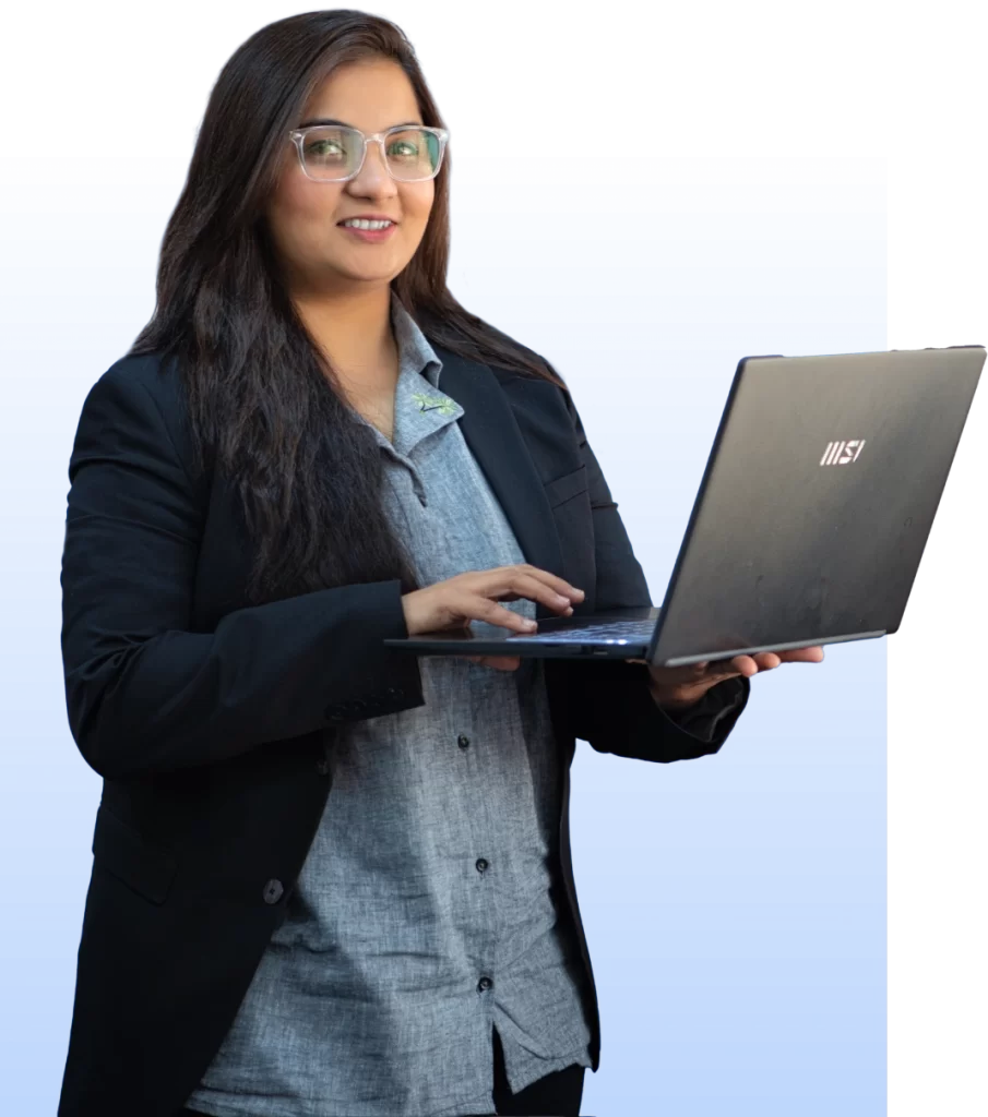 a woman holding a laptop