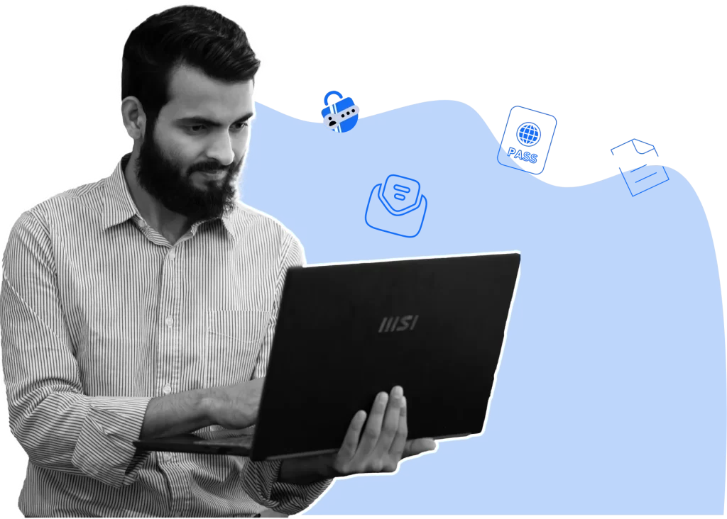 a man holding a laptop